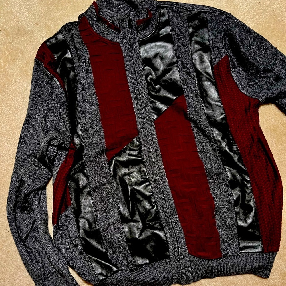 The look and feel of leather without the price. This very attractive sweater.​​